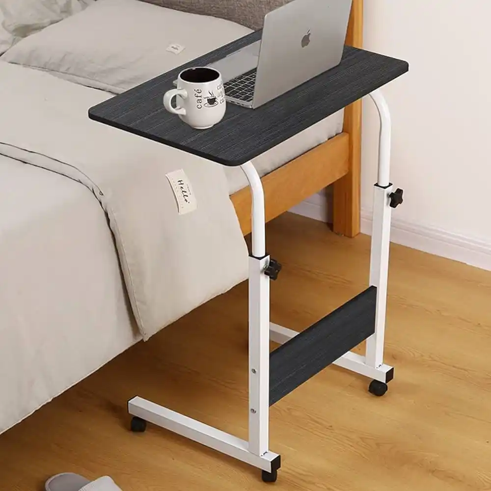 Adjustable and moveable table