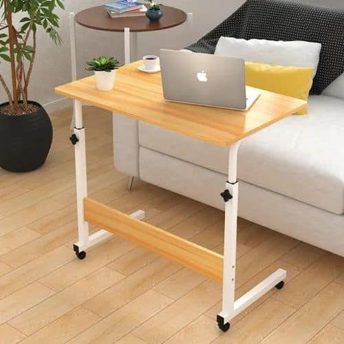 Adjustable and moveable table